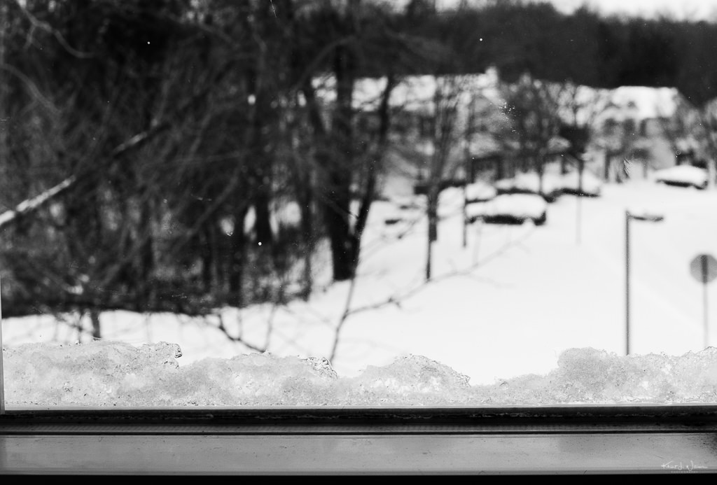 snow on the ground, view from a window