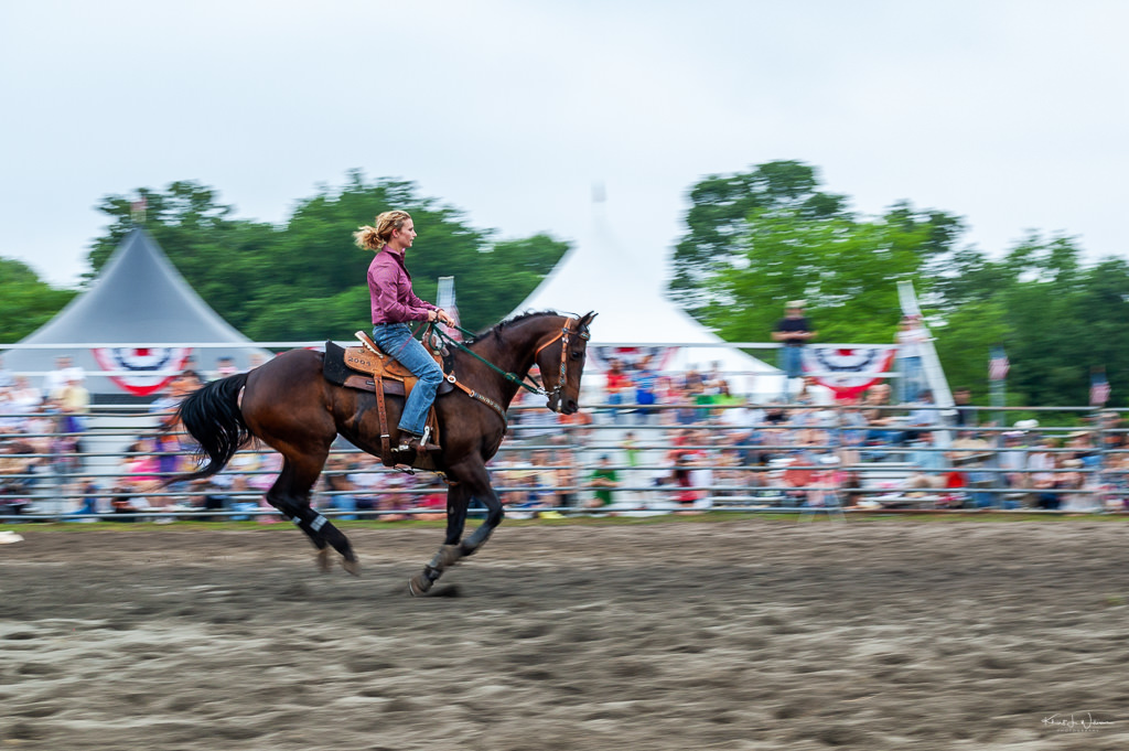 cowgirl racing horse