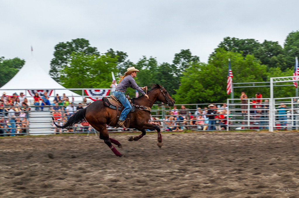 cowgirl racing horse