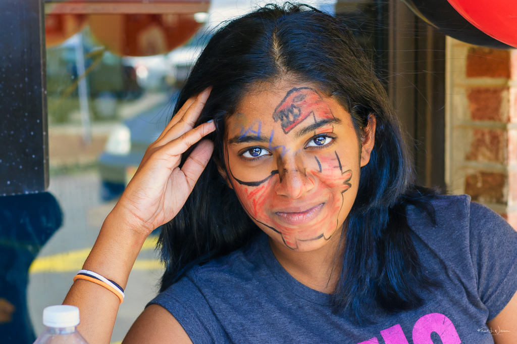 young woman with face paint