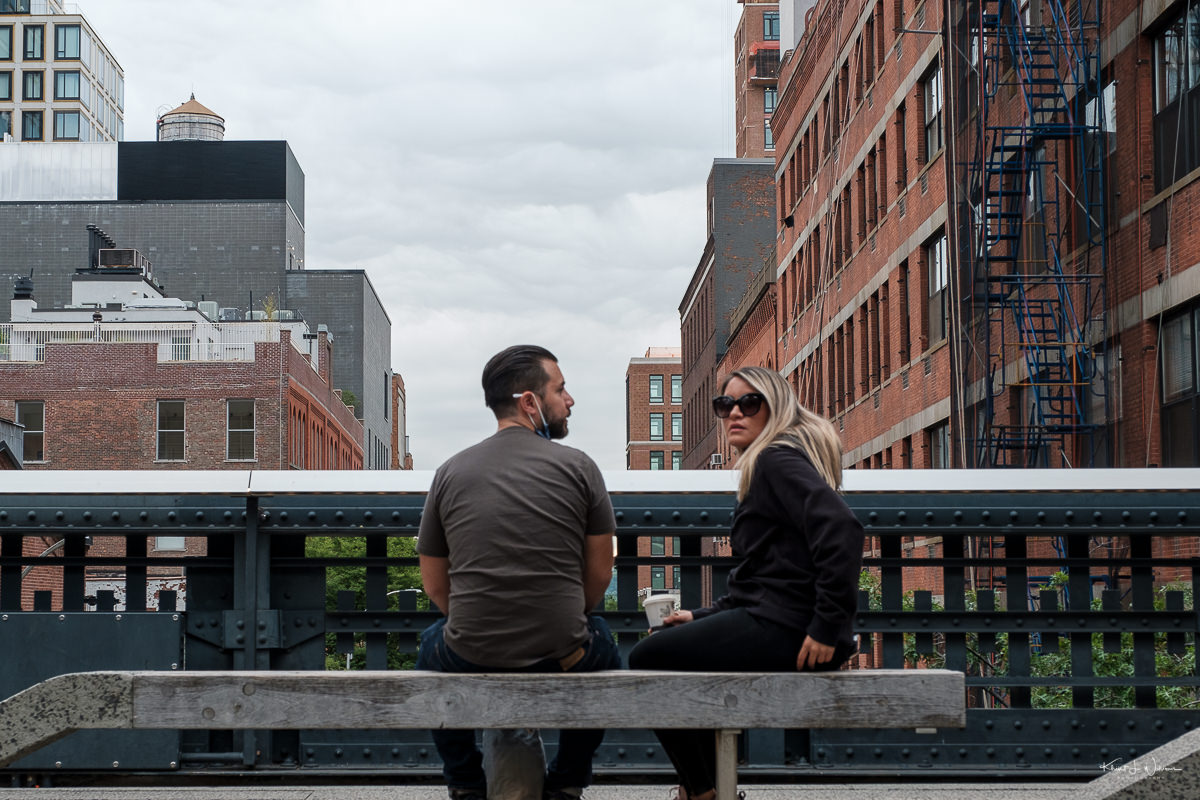 white couple sitting on bench on The High Line, New York, New York