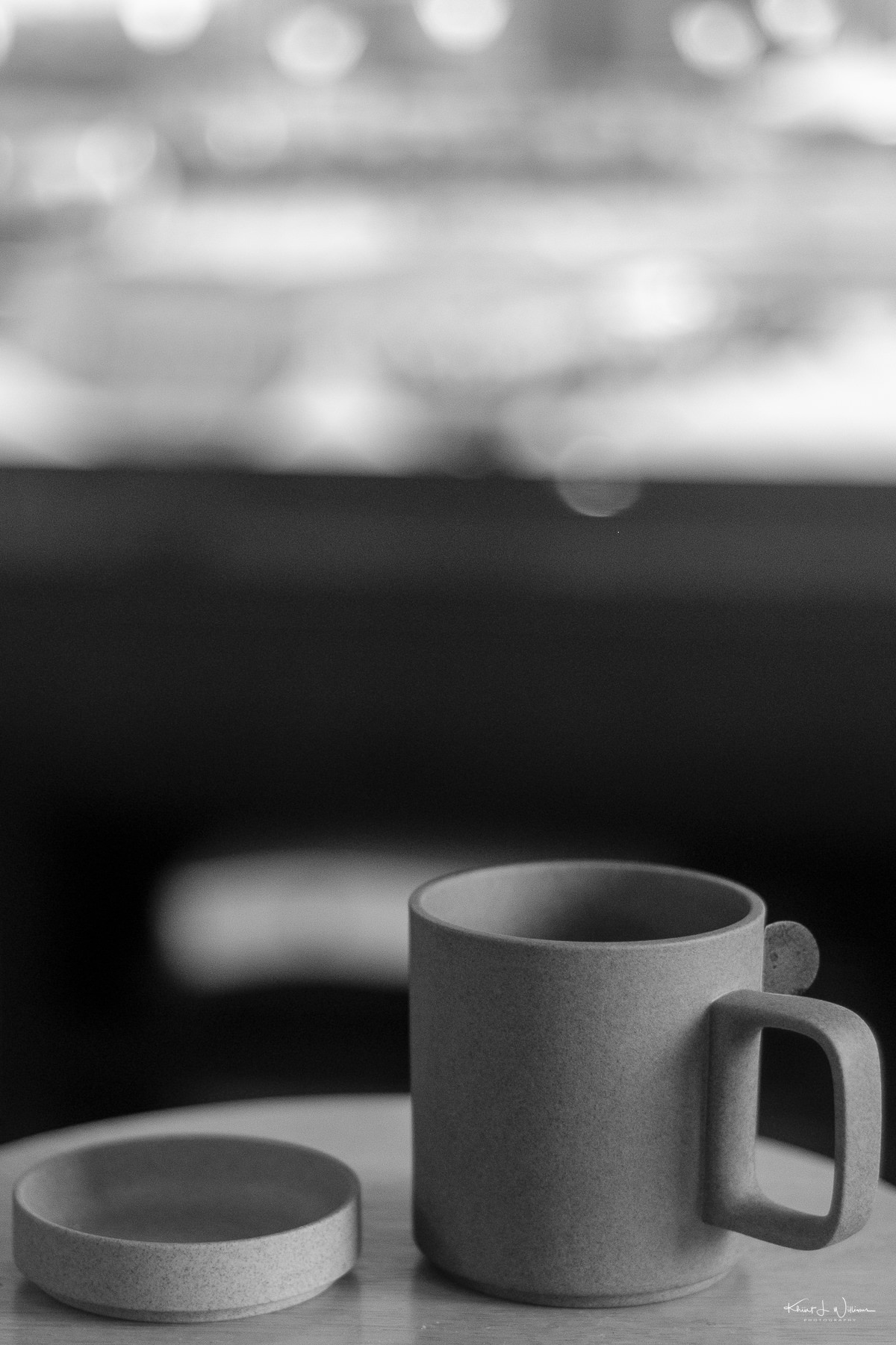 Coffee mug and saucer in black and white